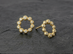 Cirkel �restikker i guld med diamanter