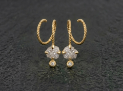 Creol �reringe med r� diamanter