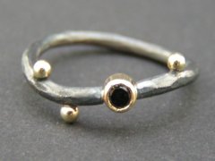 Guld og sølv ring med sort diamant