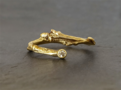 Twig guldring med champagne diamant